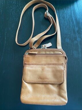Fossil cognac brown leather messenger bag.